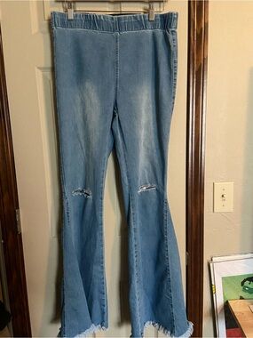 Light Blue Flare Jeans with Distressed Knees